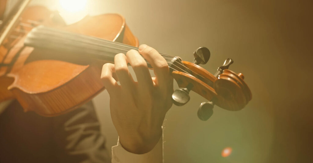 A person playing a violin.